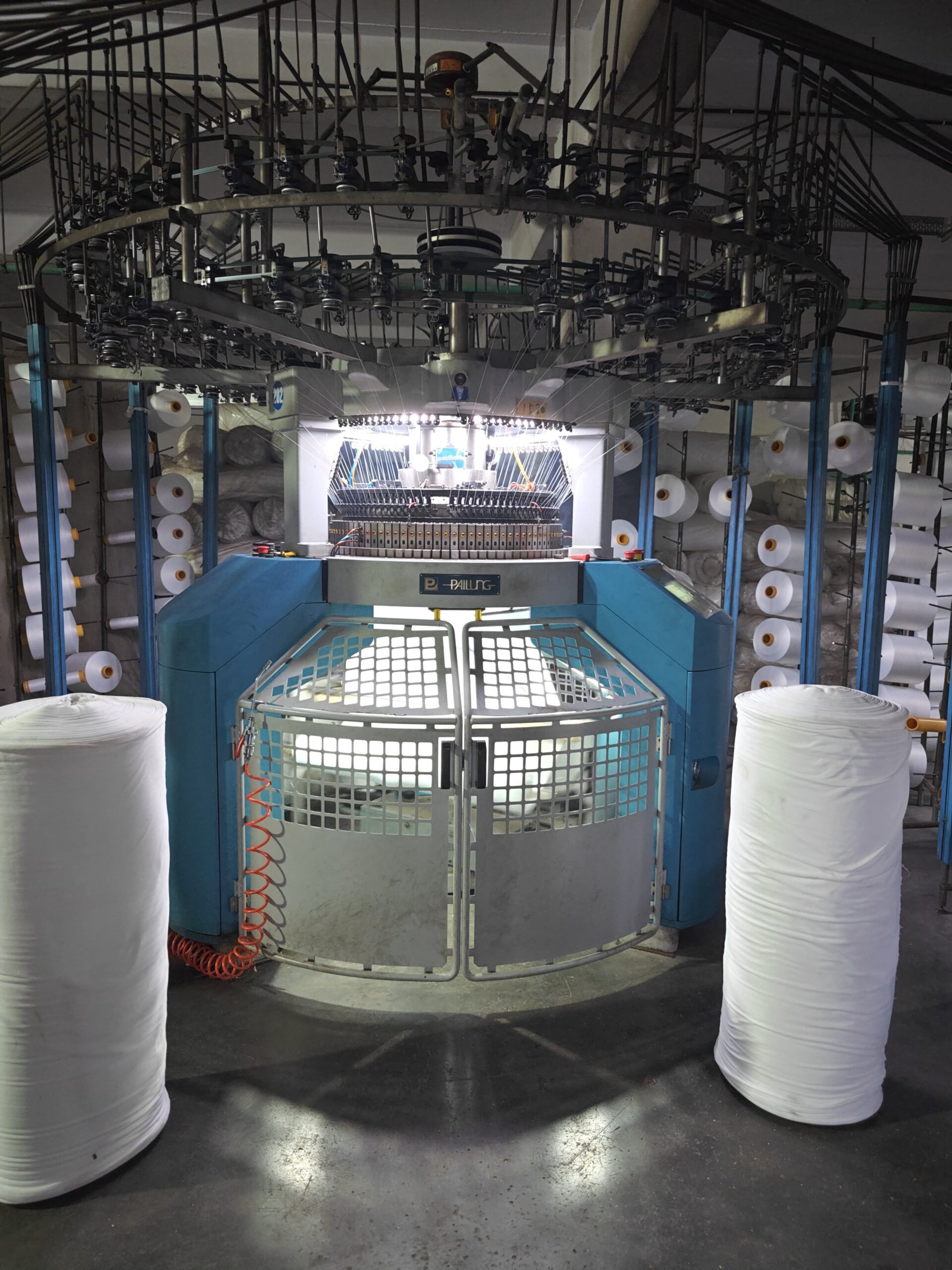 Circular knitting machine at Vishwakarma Fashion Pvt Ltd textile factory